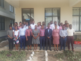  A photo of Director General's representative Mr Akida Khea and participants during the official opening of awareness training on quality management system and risk management of which TMDA is implementing. 